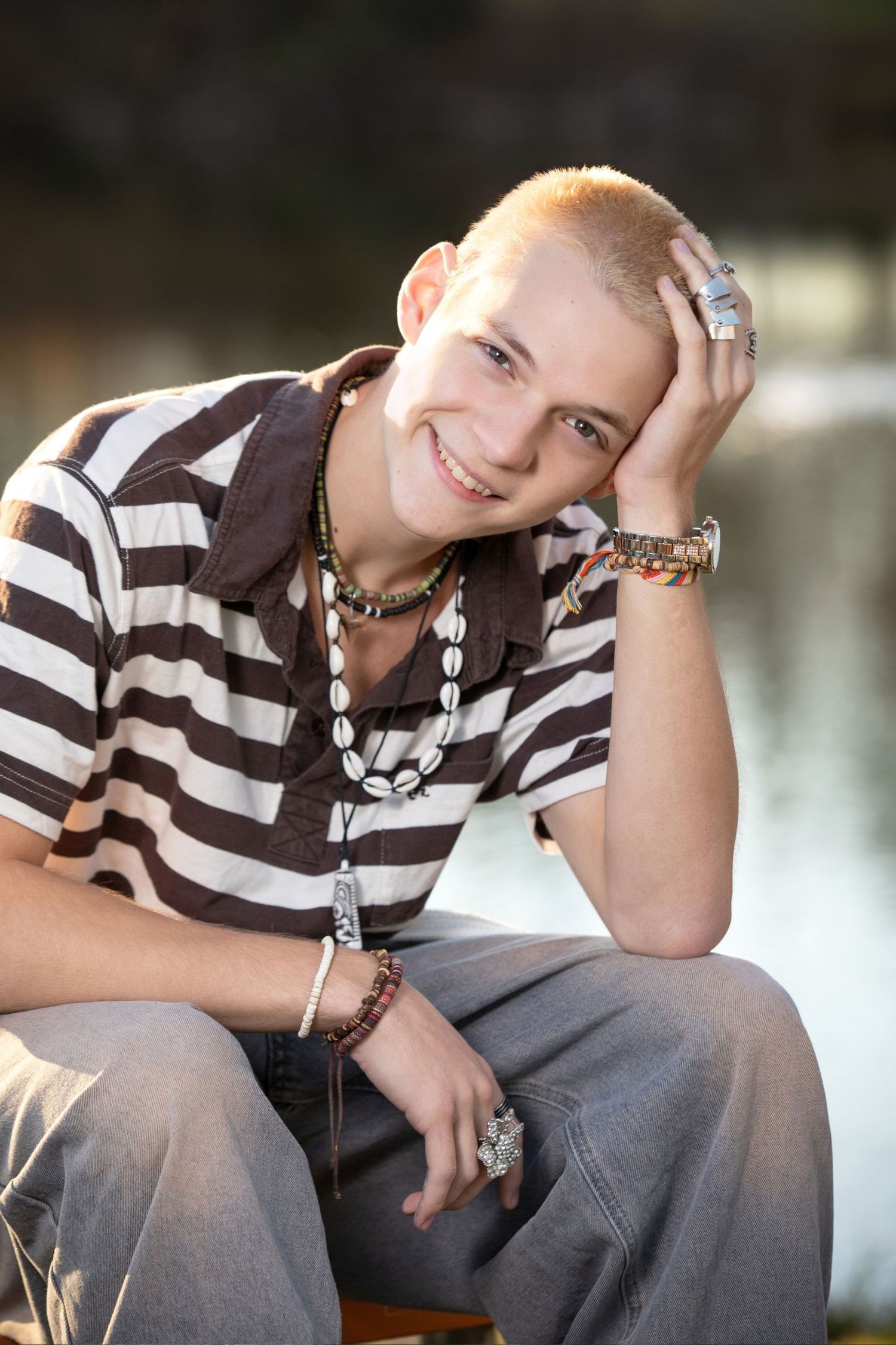Hilliard Davidson senior portrait session at Homestead Park with water views, golden light, and unique outdoor senior photos.