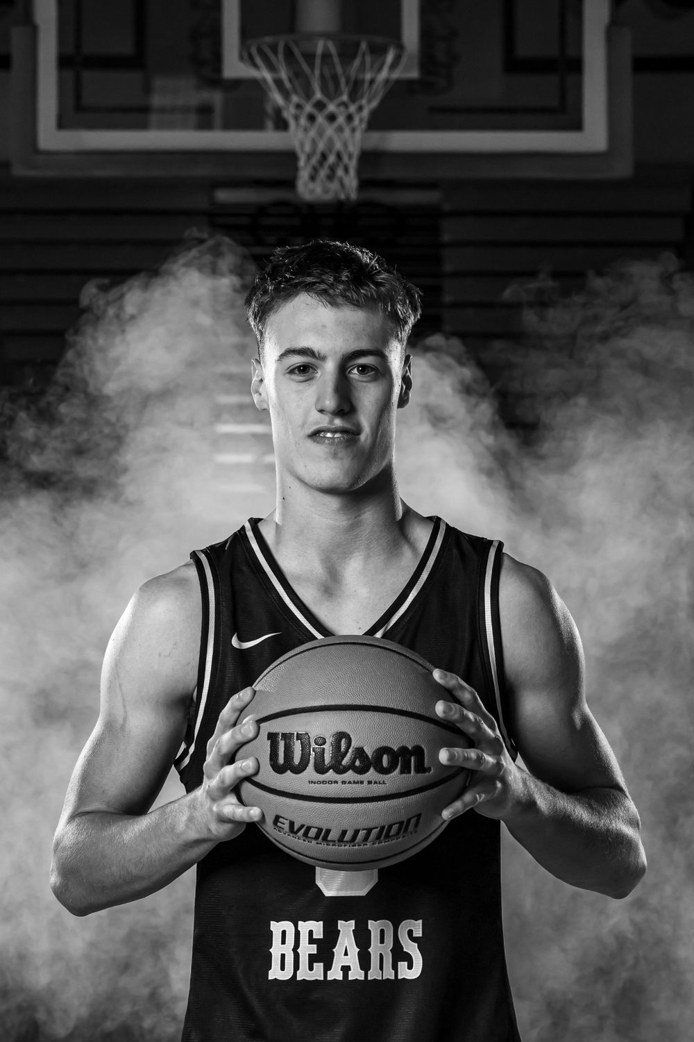 L Squared Photography sports portrait basketball player black and white in gym with smoke