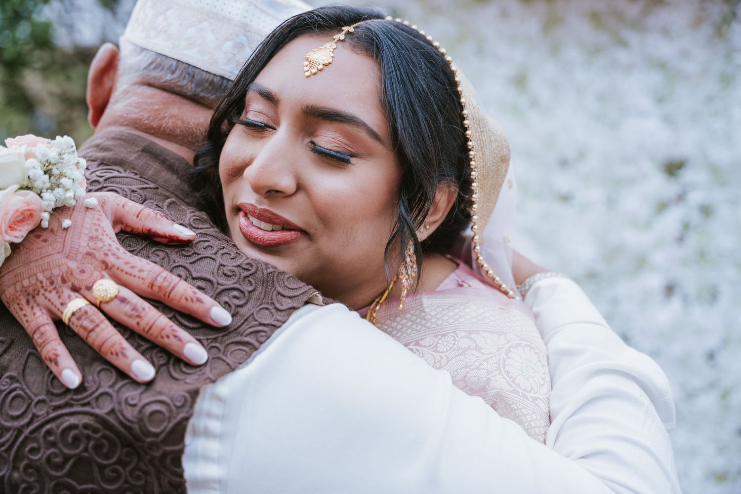 Emotional family hug with the bride after the Nikah ceremony in Sydney