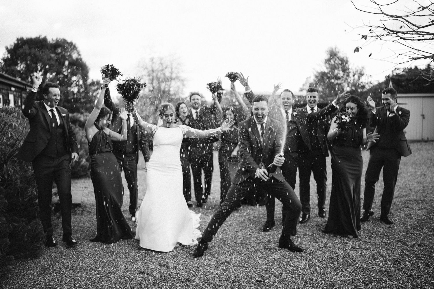 Joyful wedding moment captured at a barn wedding reception, documentary photography by Will Stedman