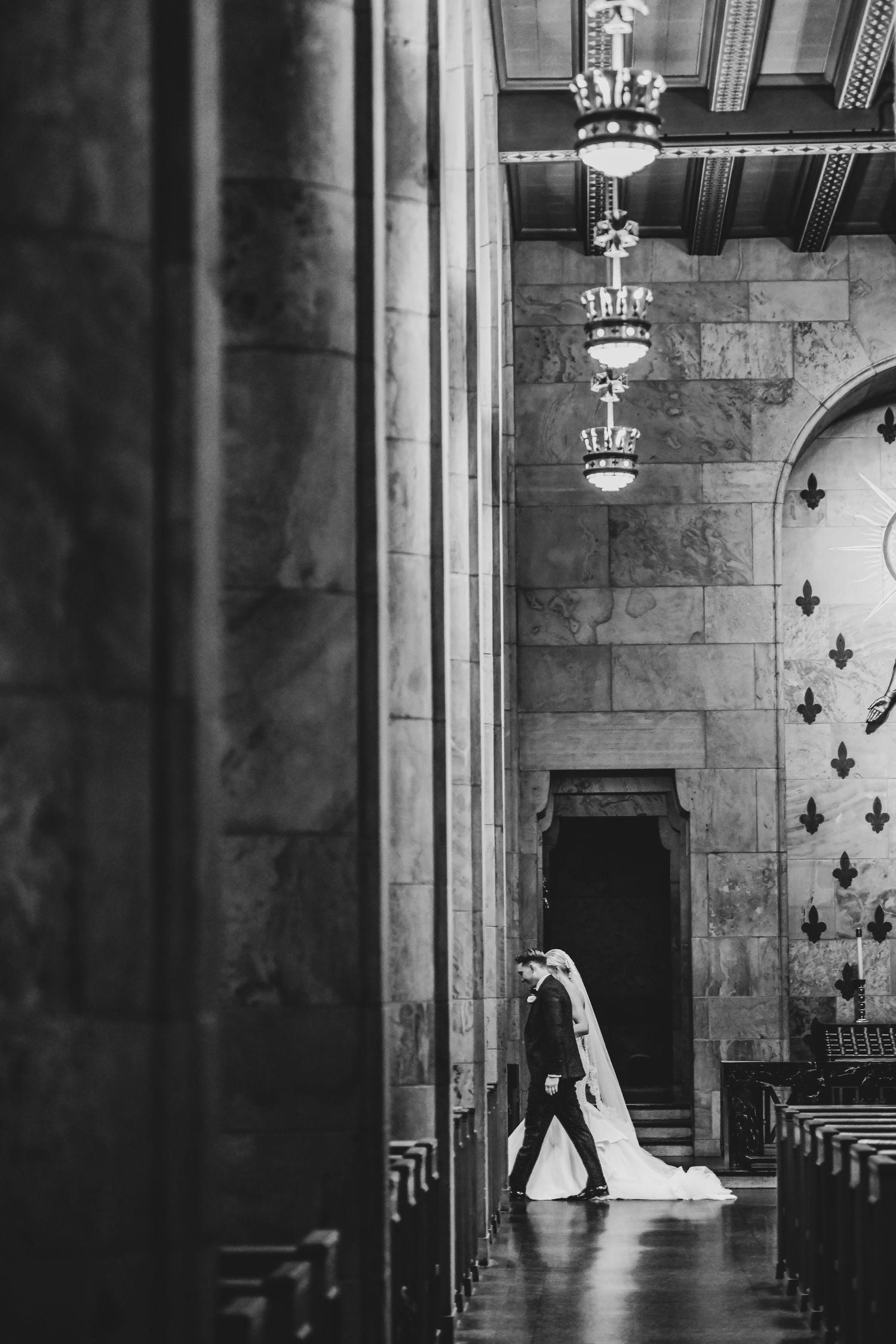 Wide view of Nicole and Payton’s Christ the King Catholic wedding ceremony