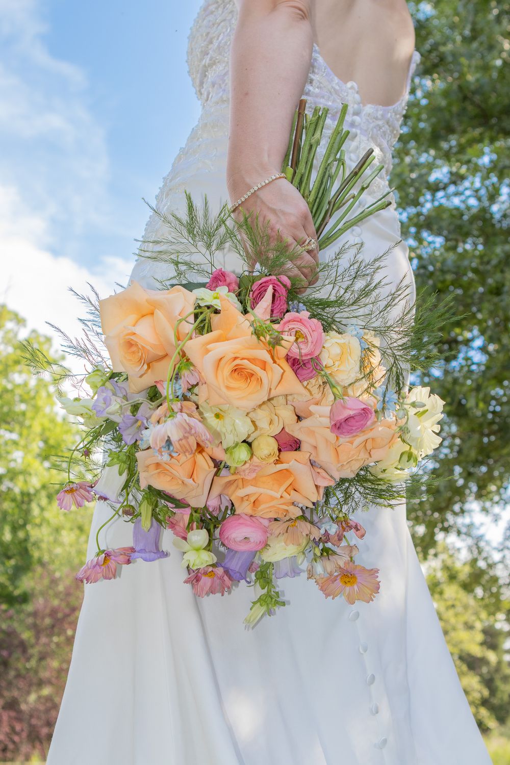 Gorgeous colorful bouquet held by bride in Strongsville Ohio on her wedding day