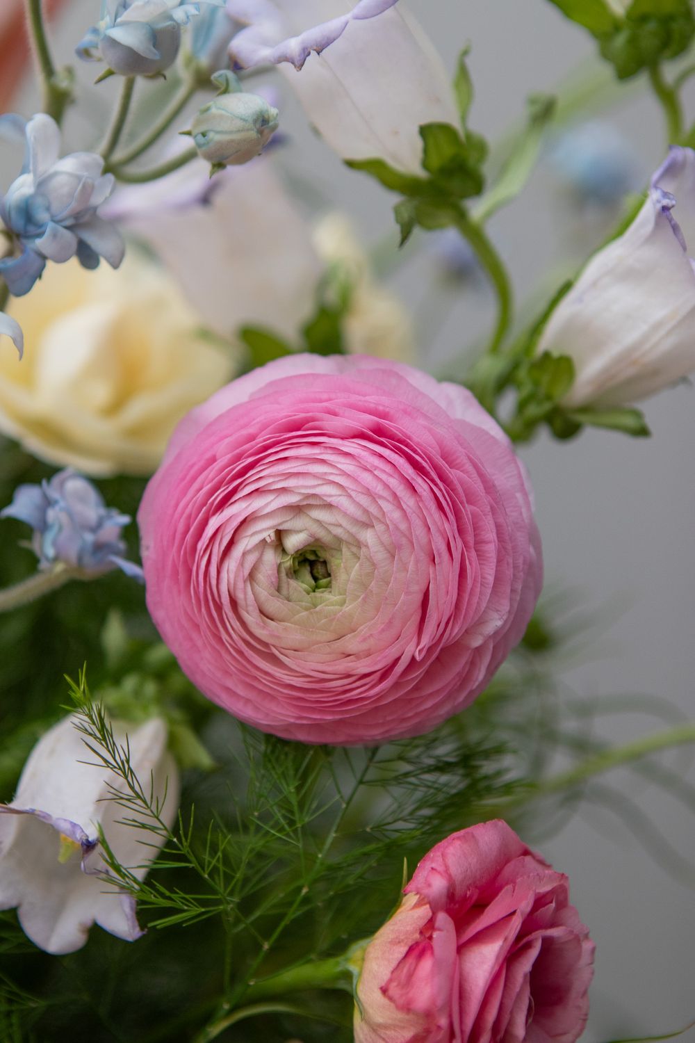 Beautiful pink flowers in a floral centerpiece for wedding photography in Strongsville.