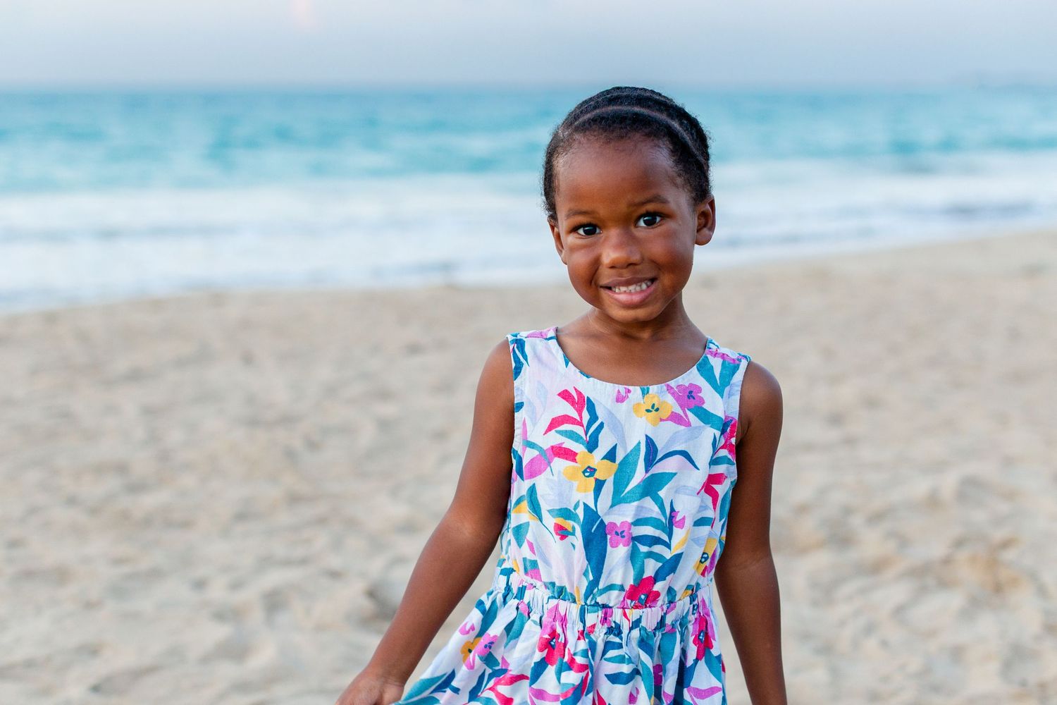 Portrait of a little girl on the beach in Isla Verde, Carolina, Puerto Rico.