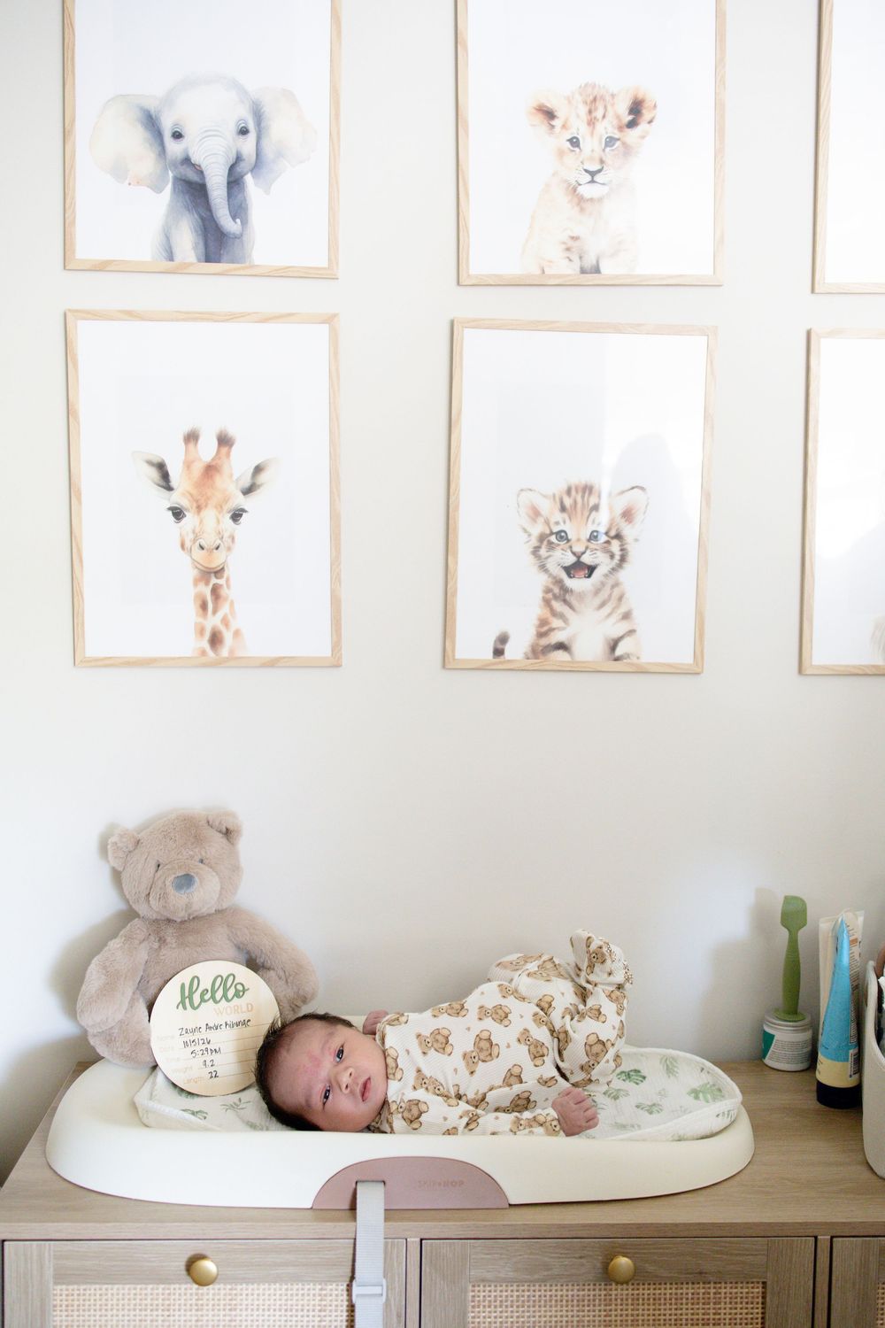 Newborn baby lying on a changing pad during a newborn lifestyle session in Oak Ridge, TN with Nina Thomas Photography.