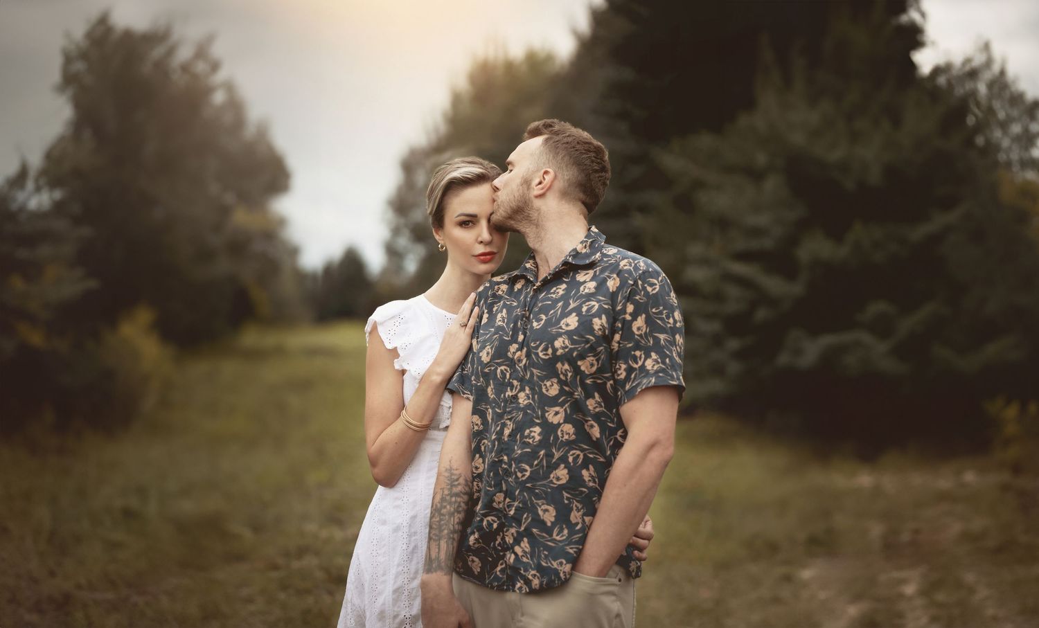 Edmonton couple portrait with beautiful soft like in background
