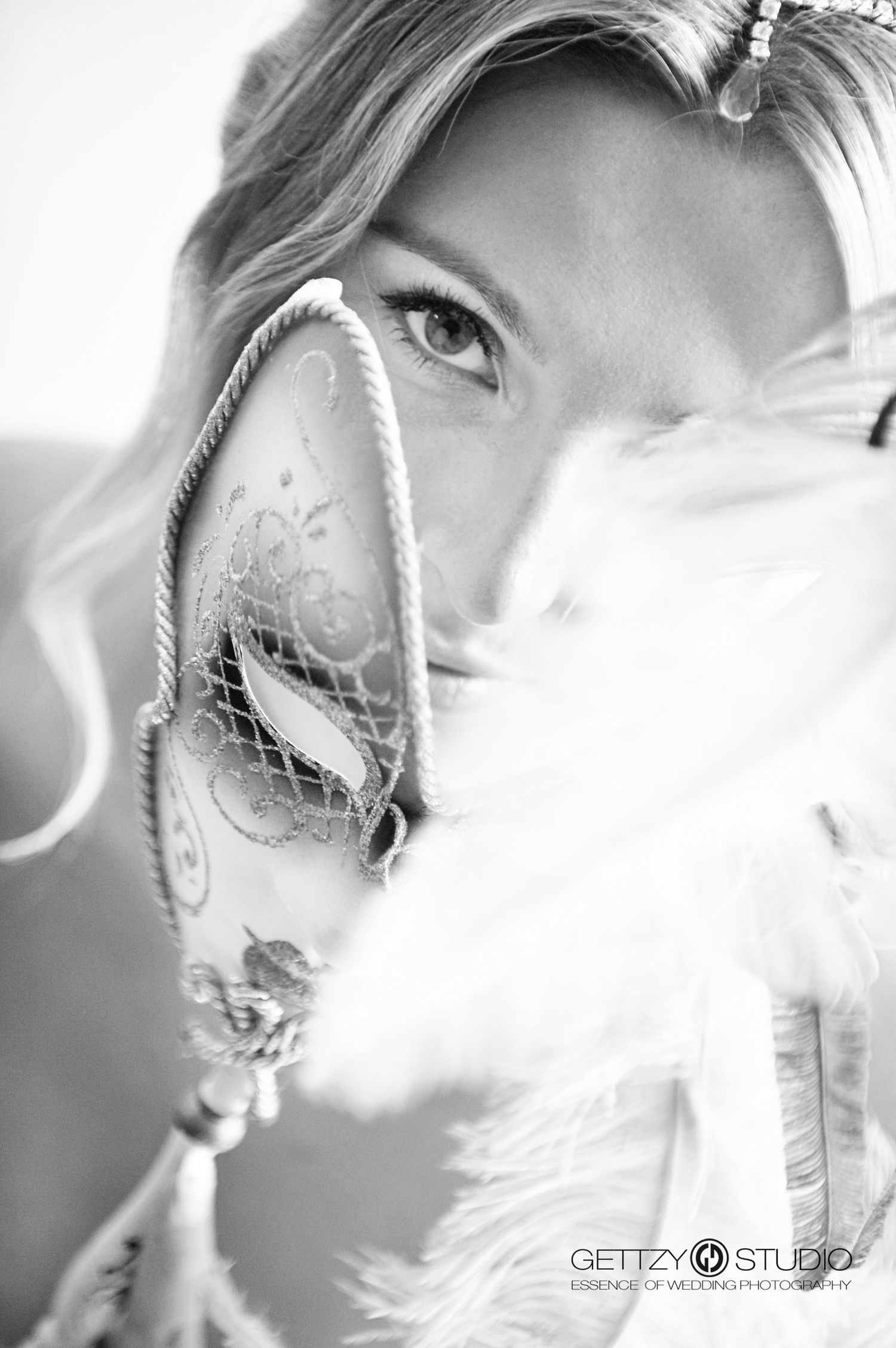 Artistic black and white close-up photograph featuring elegant bridal details.