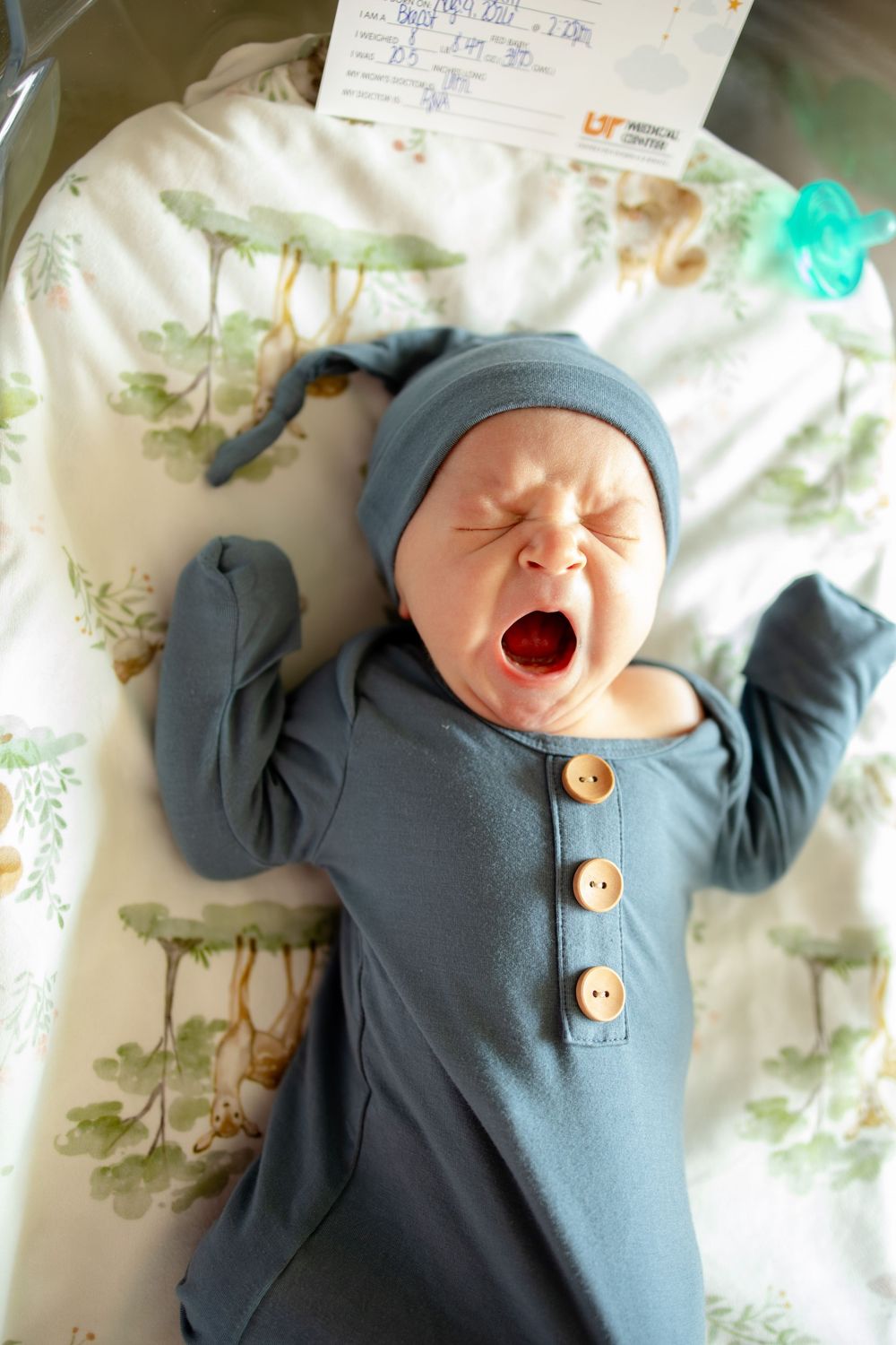 Newborn baby yawning fresh 48 newborn photography at University of Tennessee Medical Center in Knoxville, Tennessee.
