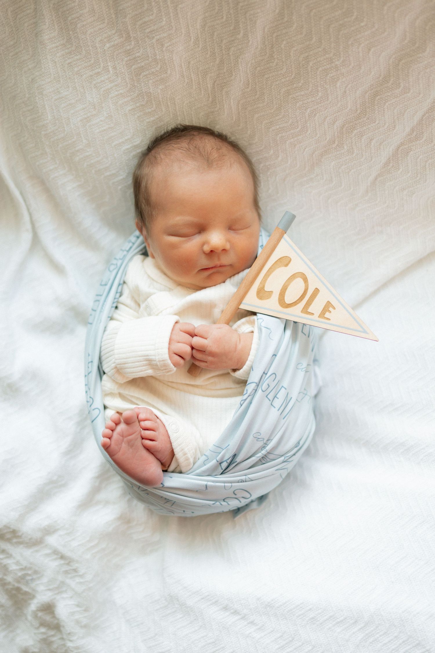 Newborn baby named Cole sleeping peacefully, fresh 48 newborn photography at University of Tennessee Medical Center in Knoxville, Tennessee.