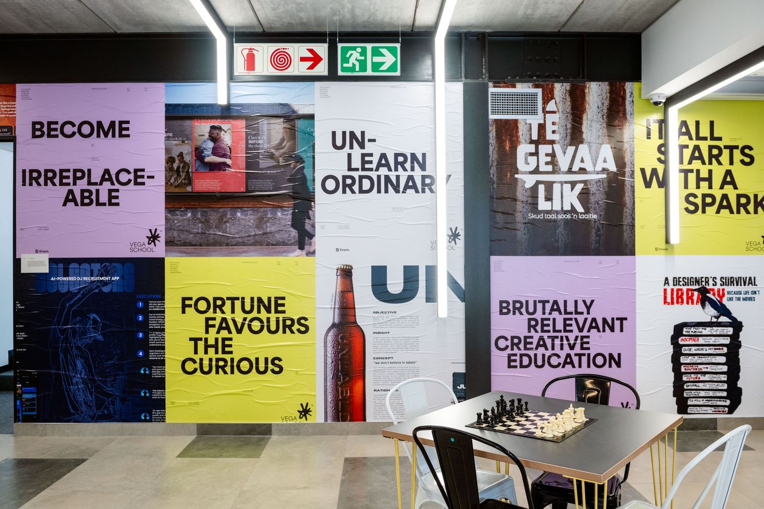 Colourful motivational wall graphics inside the modern Emeris Sandton Campus.