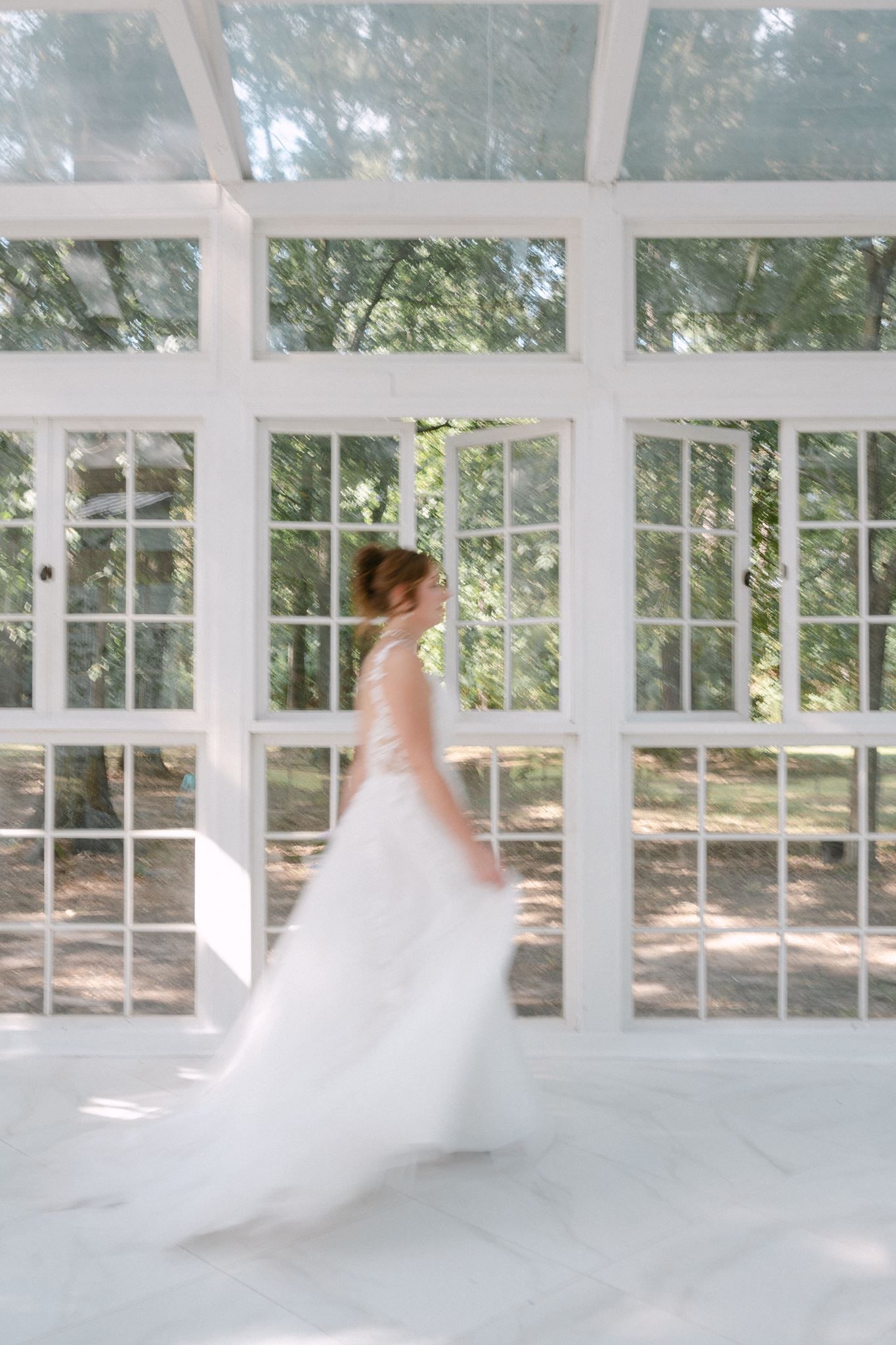 Blurry bridal portrait at Oak Atelier in Conroe.