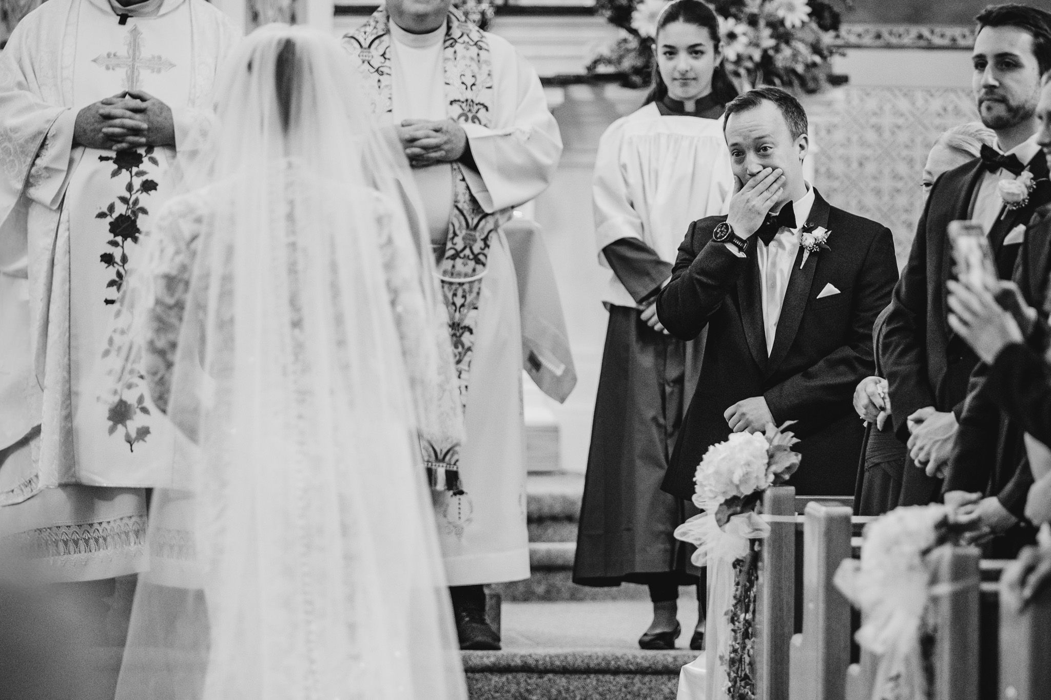 A series of candid wedding ceremony photos capturing special moments between the couple and their guests.