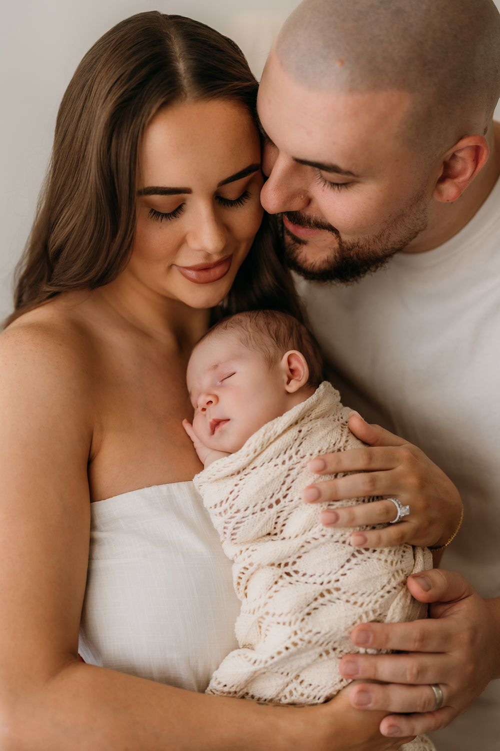 quiet moment between family in newborn photoshoot in Sydney