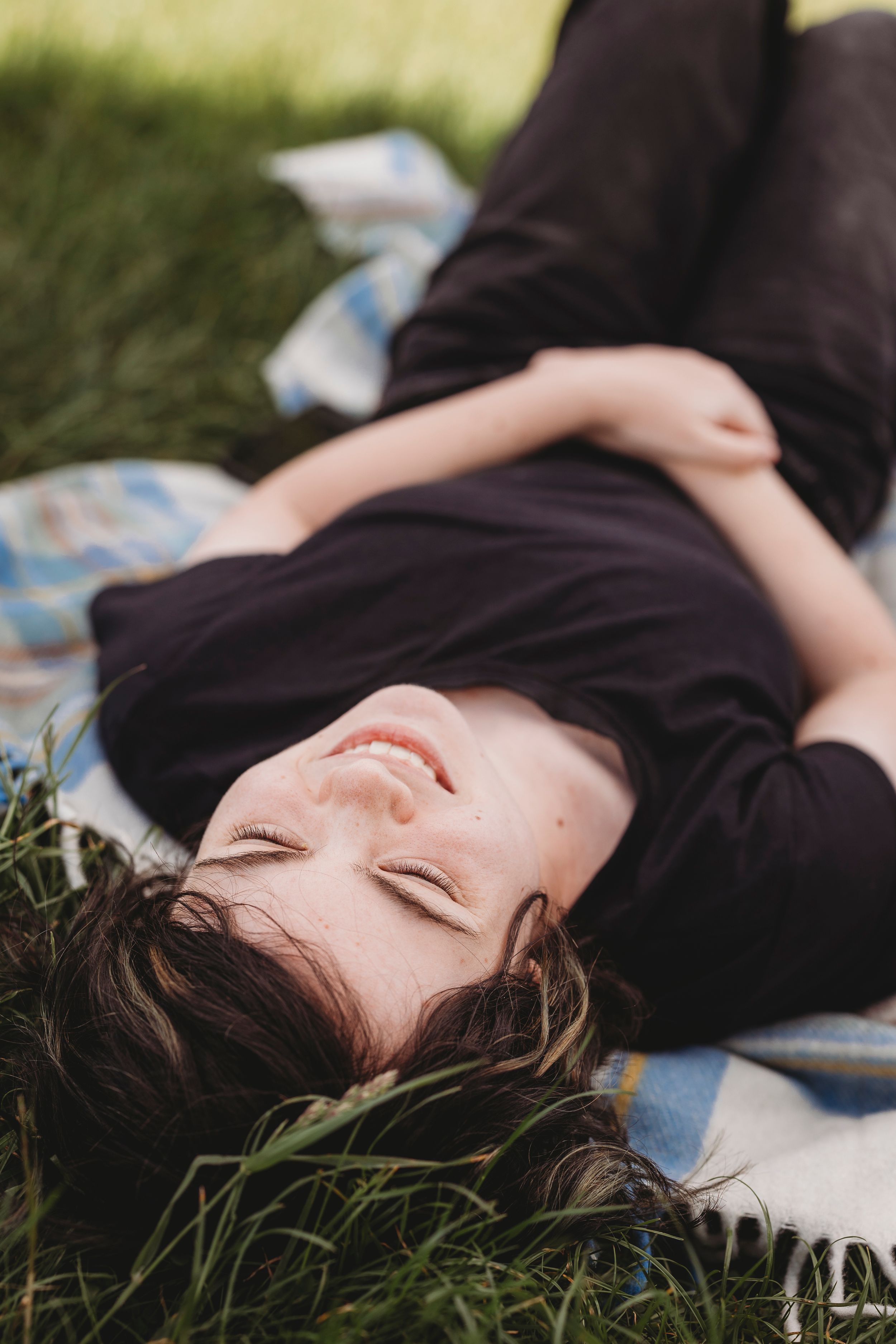 A peaceful moment lying in the grass on a sunny day.