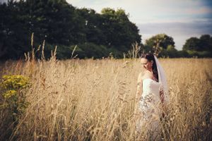 Wedding Photography bride in wheat fieldWhite Heather - Caenby Corner