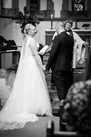 Bride and Groom ceremony holding hands Epping Essex