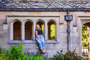 a posed senior portrait with expert lighting and vibrant colors