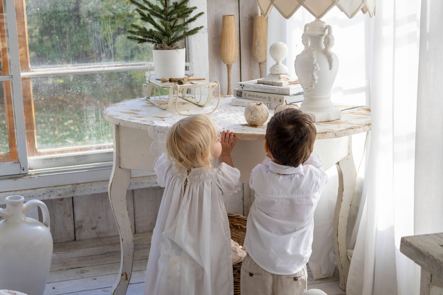 A joyful toddler's playful curiosity captured as they interact with their surroundings.