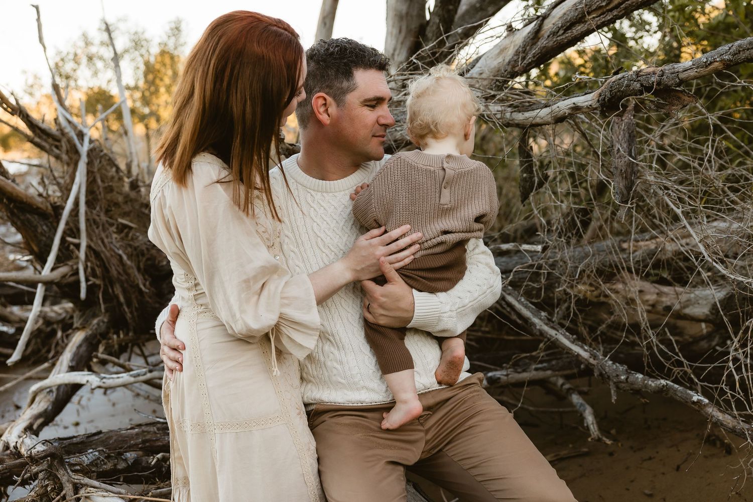 Gay Dads with kids cuddle during Brisbane family photo shoot
