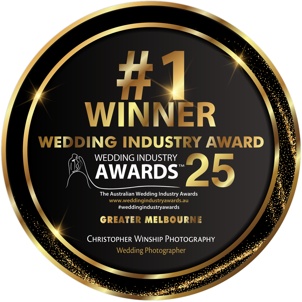 A gold and black circular award badge for Wedding Industry Award 25, highlighting a #1 Winner achievement.