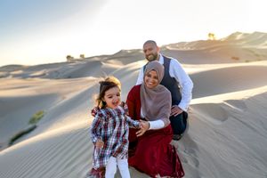 family enjoying sunset in dubai