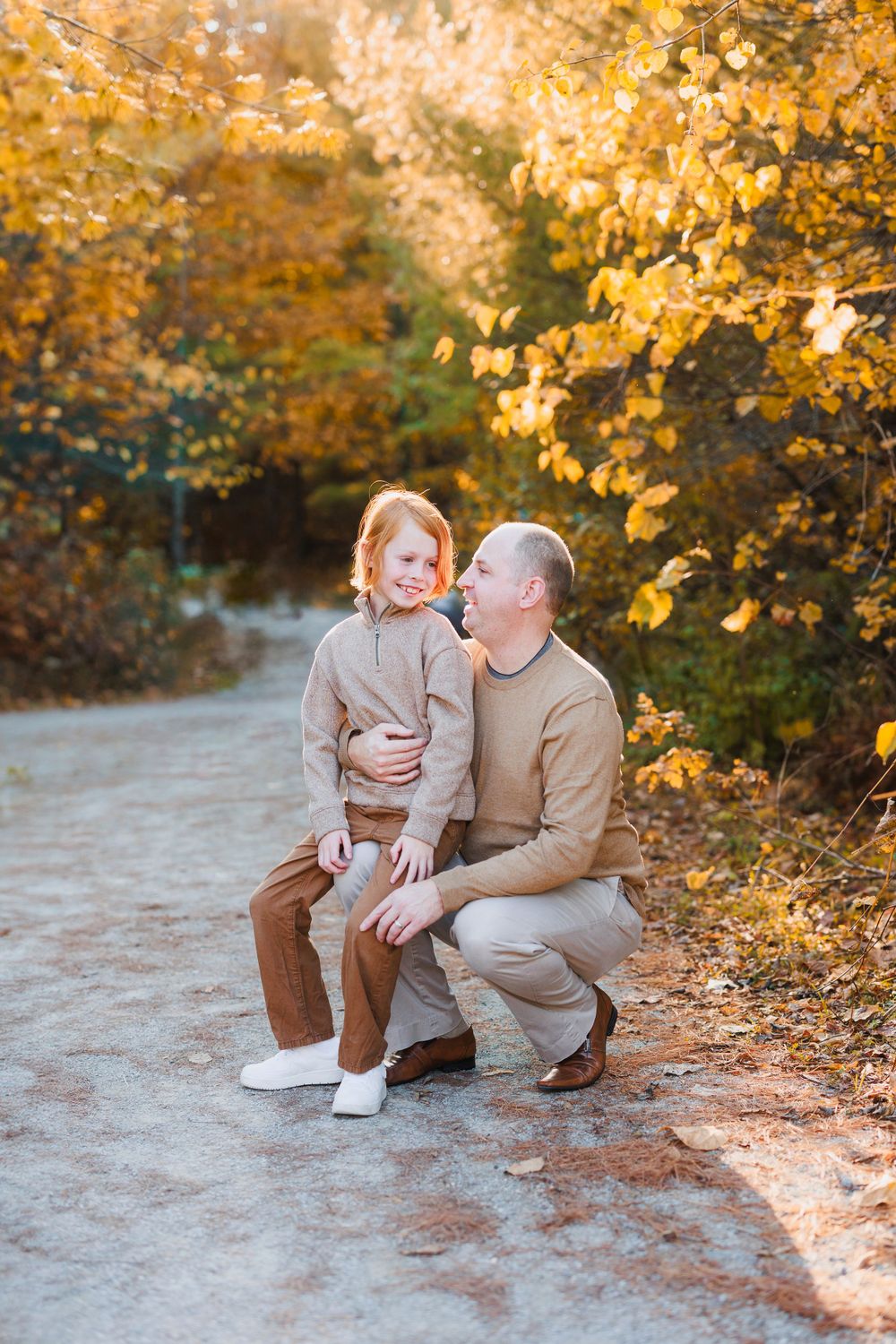 Father and son in a park. Toronto family photography.
