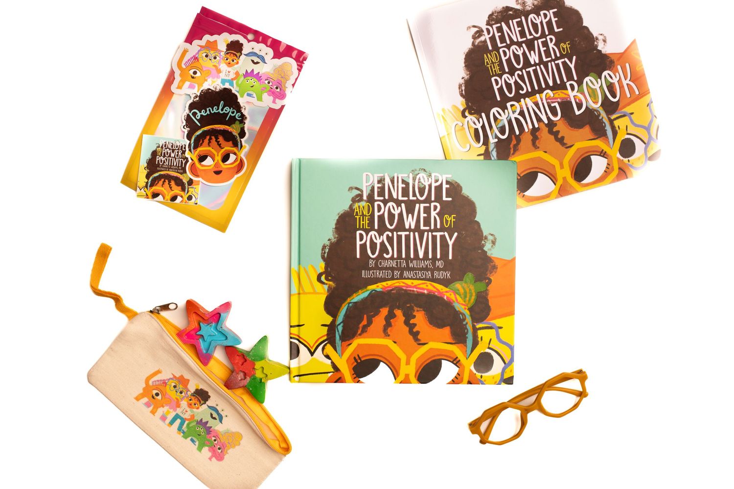 Collection of positivity-themed books with sunflower designs and decorative accessories.
