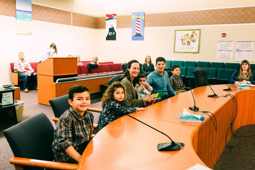 Family of 6 sitting in court for their adoption hearing, Santa Maria, CA