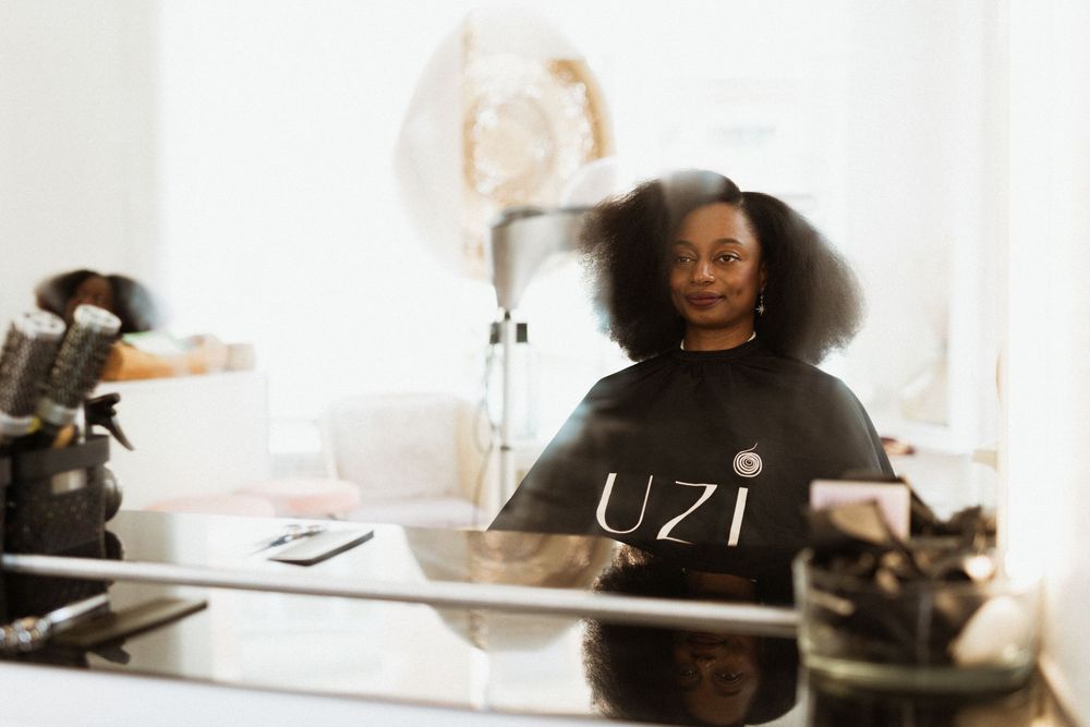 Stylish salon interior with professional beauty equipment and modern decor.