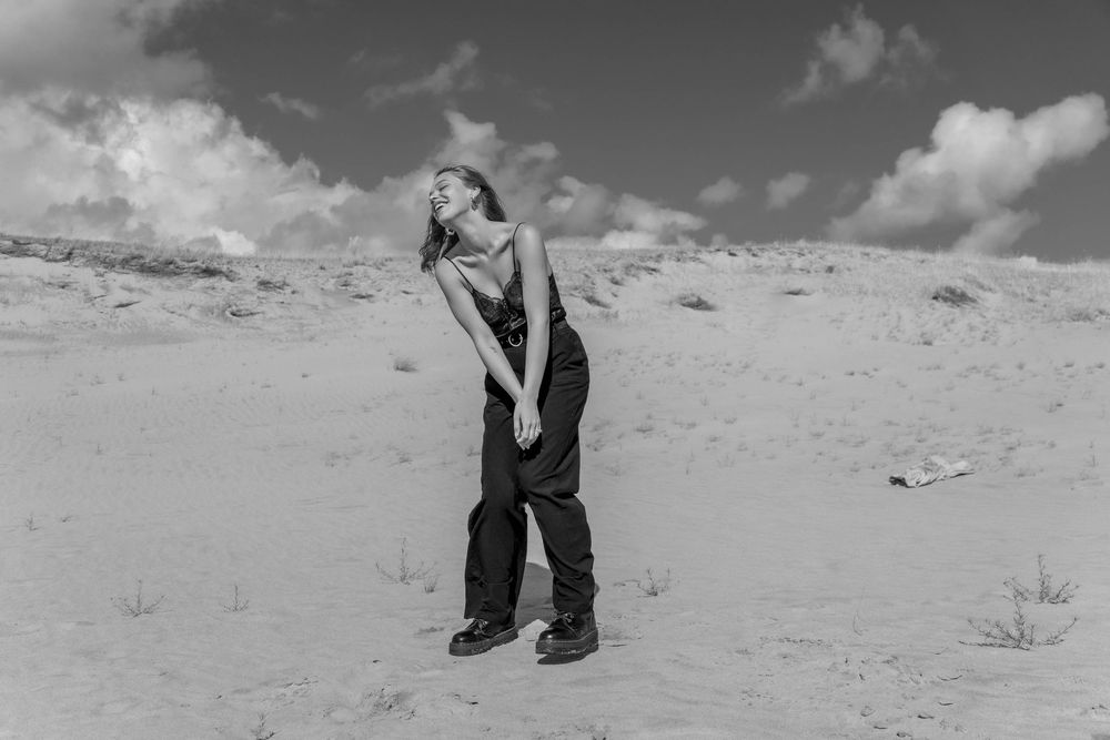 A woman's portrait at the seaside.