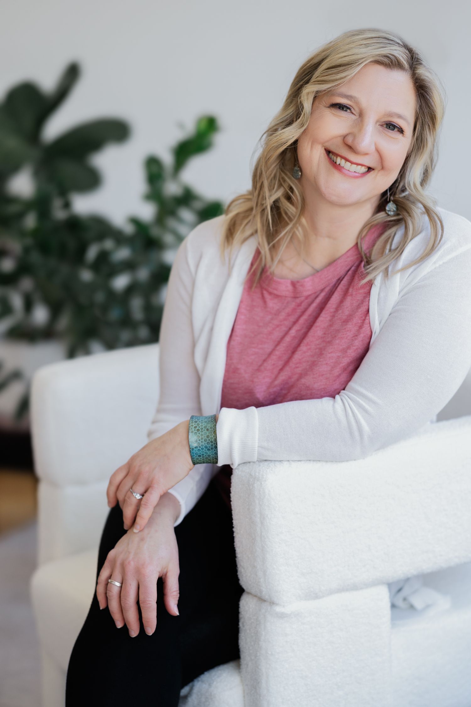 A female business owner collaborates with a social media consultant to refine her Instagram content strategy for engagem