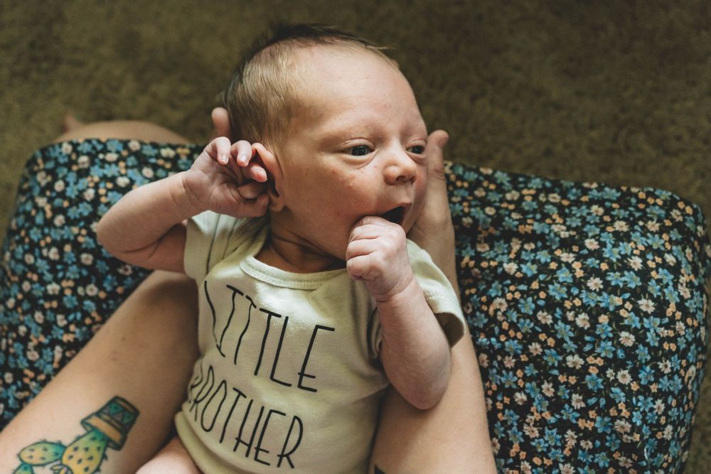 Candid and connected newborn photography, captured right where your story begins—home. in palm bay florida