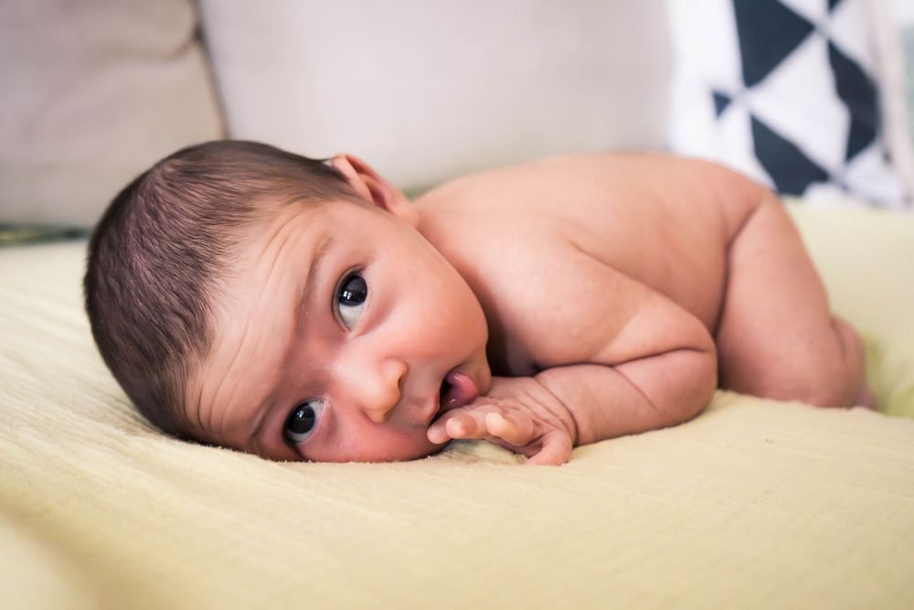 Authentic newborn photography that captures connection, love, and real-life beauty at home in Palm Bay Florida
