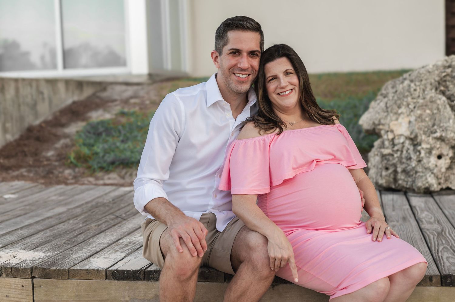 Husband and Wife maternity photos Starkey Ranch