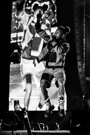 Popcaan performing on stage at Reggaeland Festival
