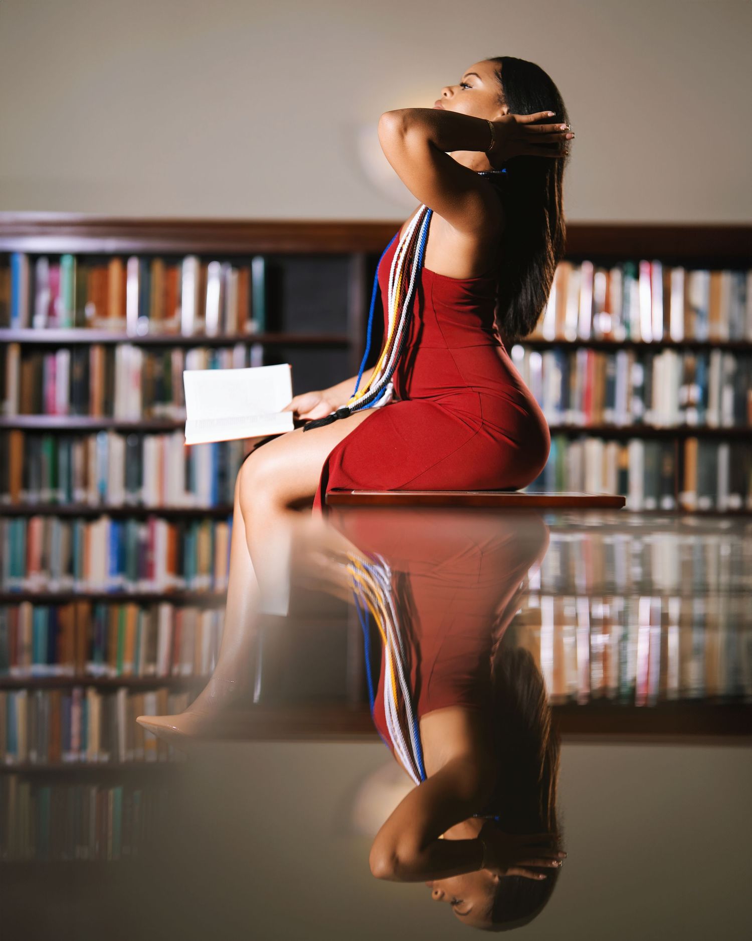 Library graduation portrait — lifestyle photo by Timoy B Photography, Atlanta.