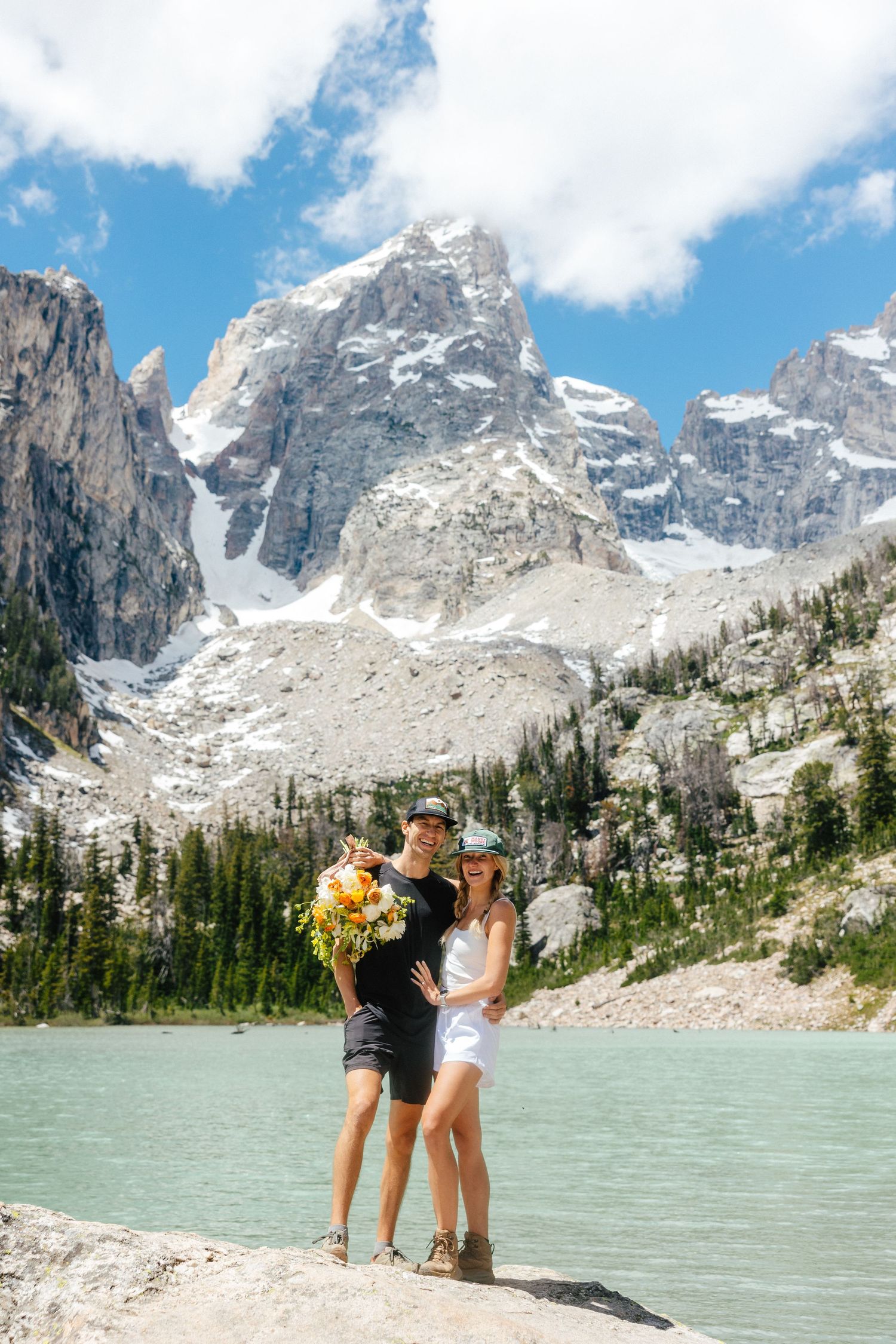 Scenic mountain lake views with turquoise waters and snow-capped peaks in Grand Teton National Park.