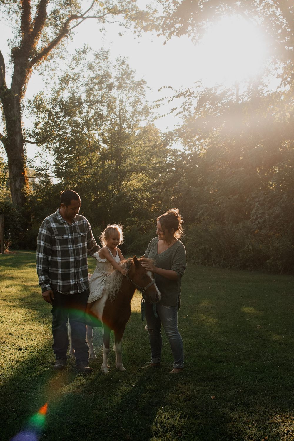 Family playing on their small homestead in Silver Creek, NY