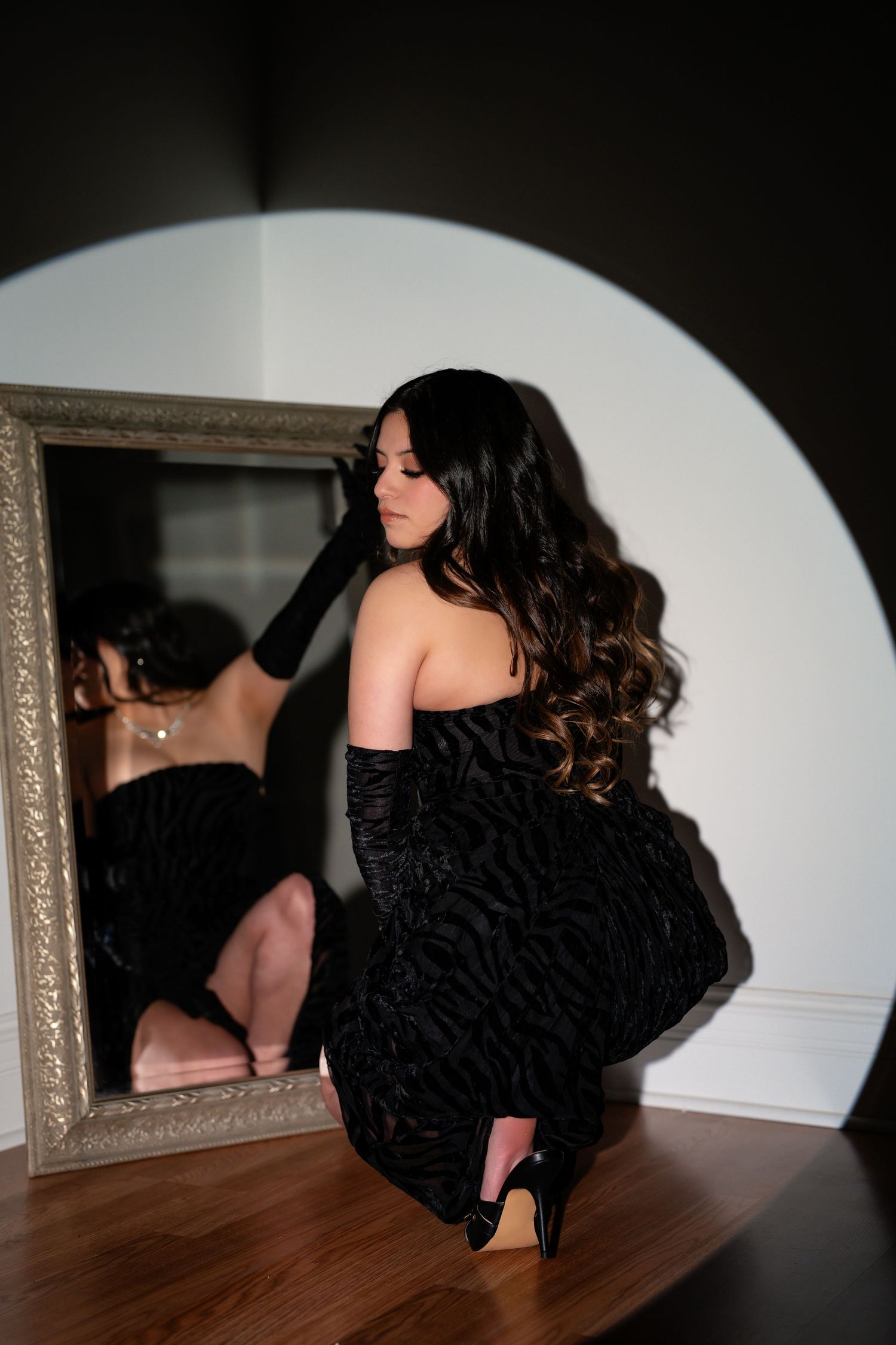Artistic black and white portrait series with ornate mirror and dramatic shadows.