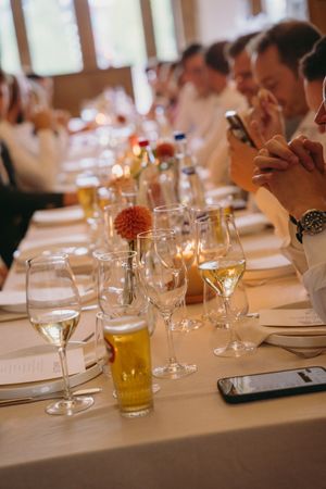 Elegant table setting with wine glasses and place settings at a formal event.