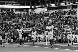 Multiple action photos of track and field athletes competing in a race at a stadium with spectators in the background.