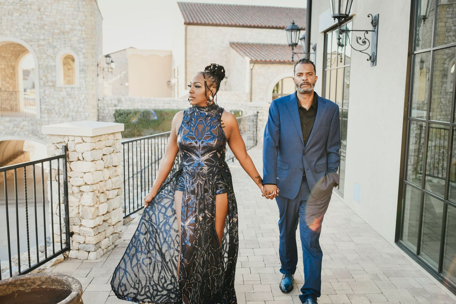 African American couple walking together during an engagement session in the Westlake area, captured in a natural, candid style