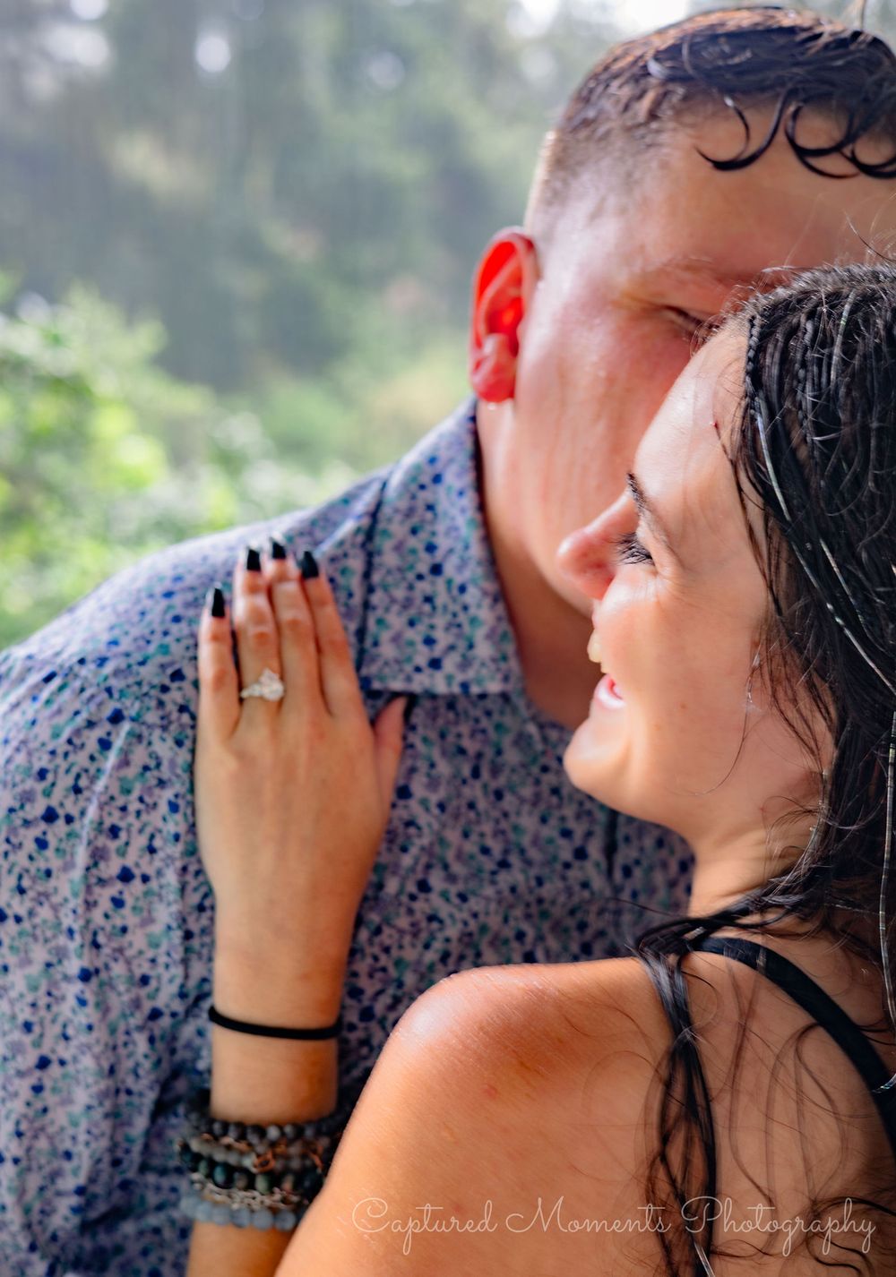 A romantic couple sharing an intimate moment in a series of progressive shots against a blurred outdoor background.