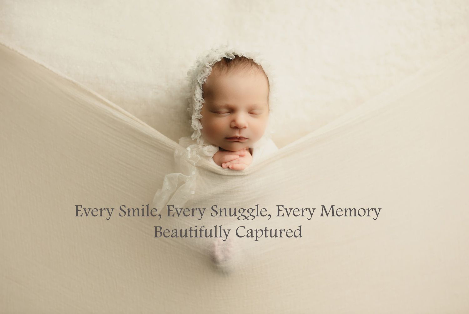 A newborn baby sleeps peacefully in a blanket wrapped in a soft white swaddle blanket. Bettendorf Iowa Quad Cities Baby photographer