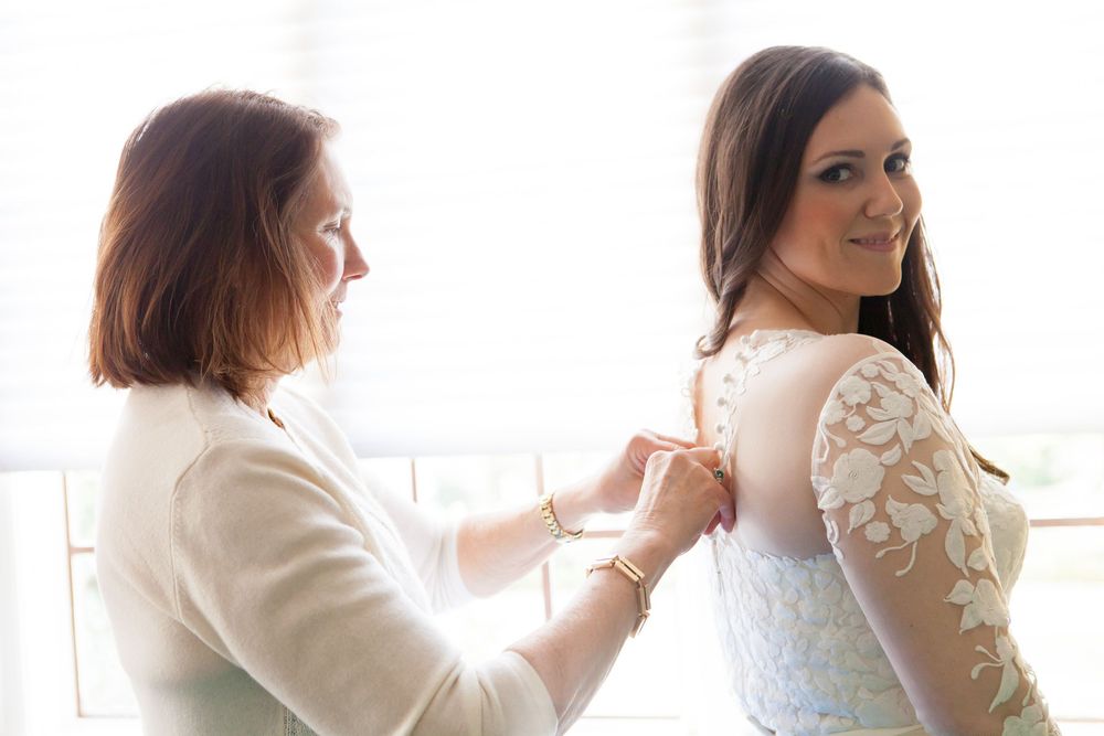 A series of wedding preparation photos showing brides getting ready in white dresses by sunlit windows.