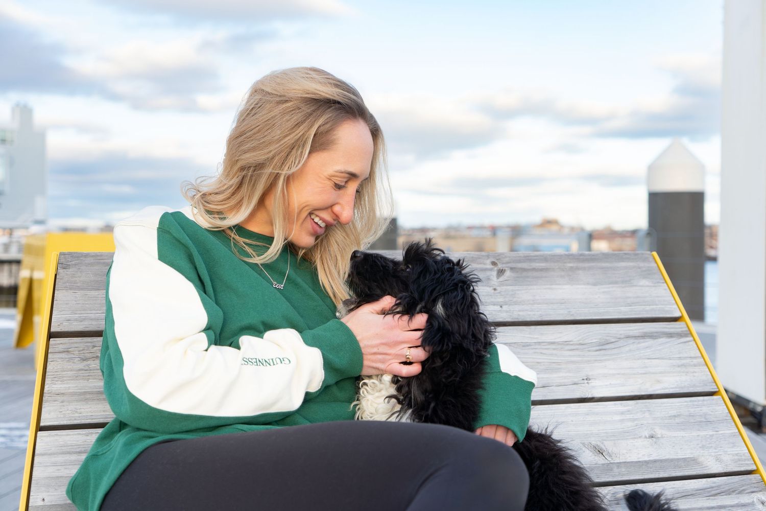 Portraits of a Water Spaniel Puppy and his Human in Boston, MA by Leah Ramuglia Photography in the Charlestown Navy Yard.