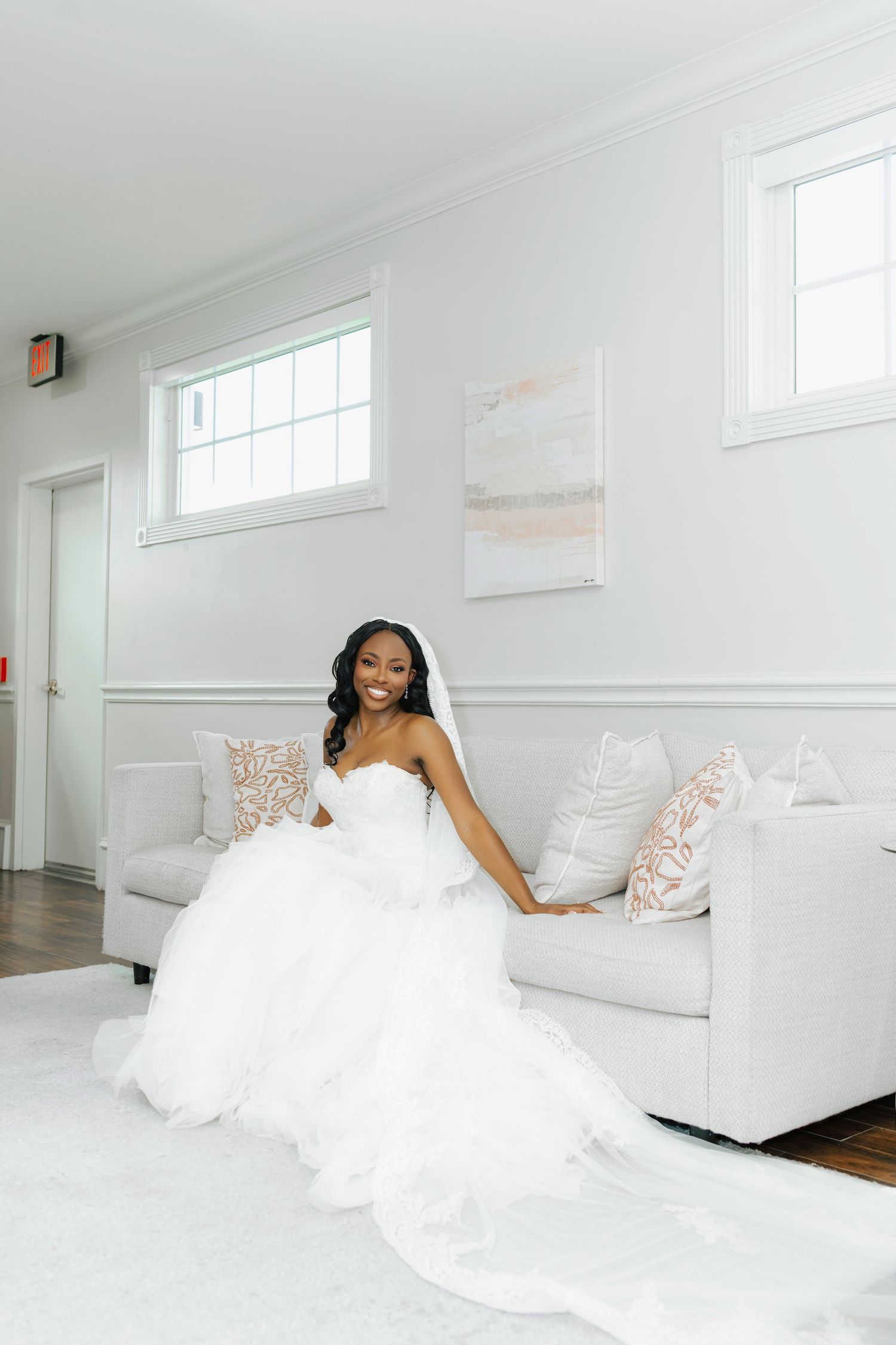 Intimate wedding portrait under delicate white veil.