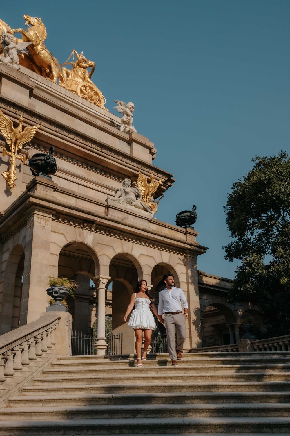 Playful couple laughing in Ciutadella Park