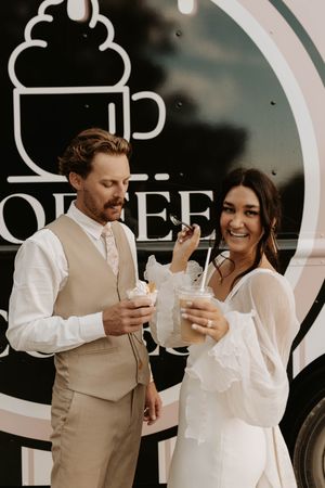 Newlywed couple shares ice cream cones together in a series of candid moments.