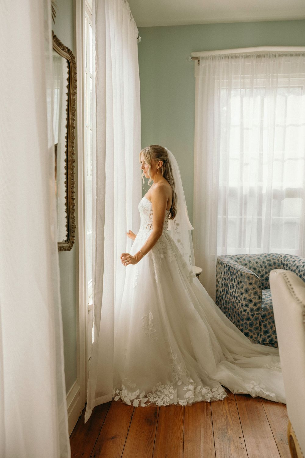 A bride getting ready for her wedding day at the Elms of Coosada venue in Alabama